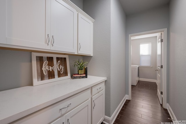 interior space featuring white cabinets