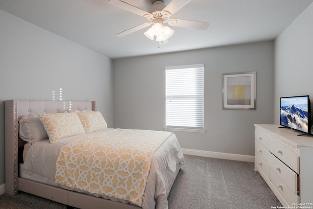 bedroom with ceiling fan and light carpet