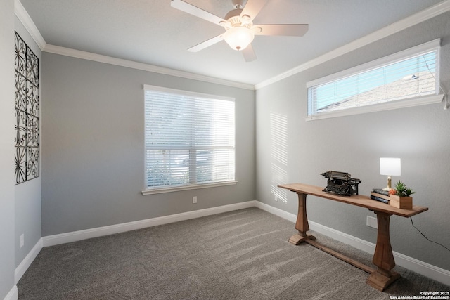 home office with carpet, ceiling fan, and crown molding