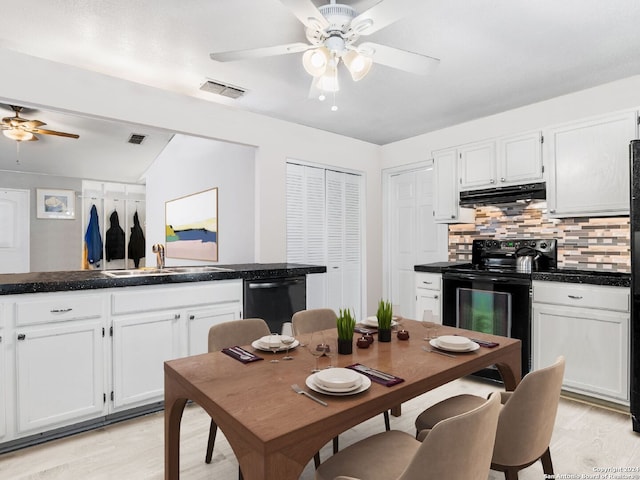 kitchen featuring decorative backsplash, sink, dishwasher, white cabinets, and black electric range oven