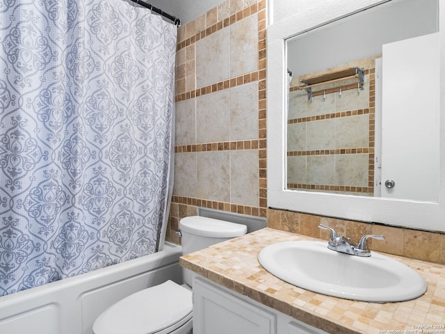 full bathroom with vanity, shower / bath combination with curtain, backsplash, and toilet