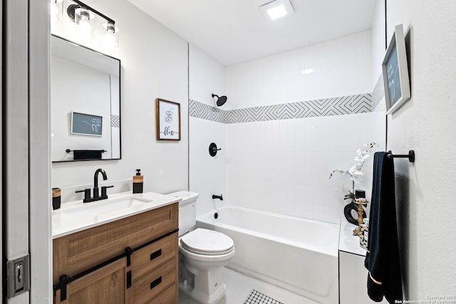 full bathroom with vanity, toilet, and tiled shower / bath combo