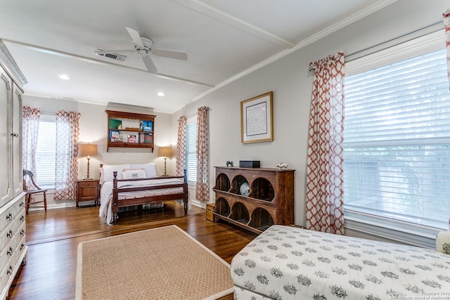 bedroom featuring crown molding, ceiling fan, and dark wood-type flooring