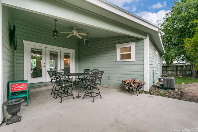 view of patio / terrace with central AC unit and ceiling fan