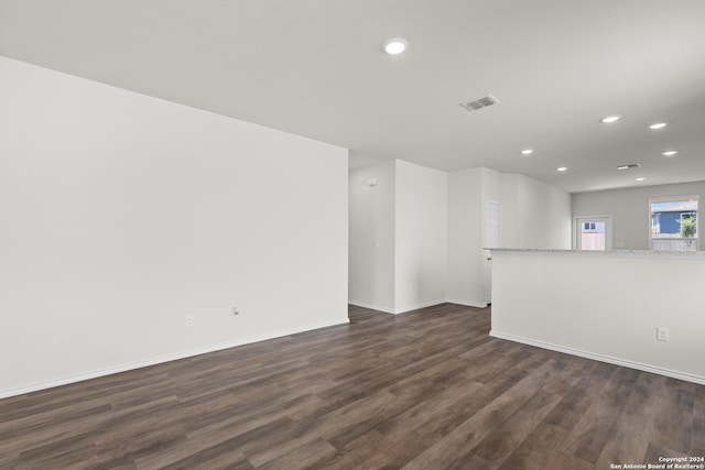 empty room featuring dark hardwood / wood-style floors