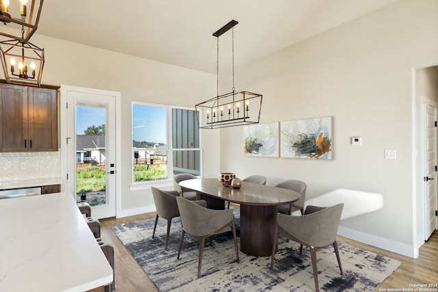 dining space with light wood-type flooring