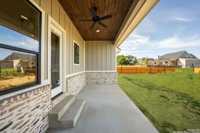 view of patio featuring ceiling fan