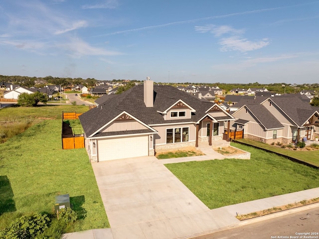 craftsman house featuring a front yard