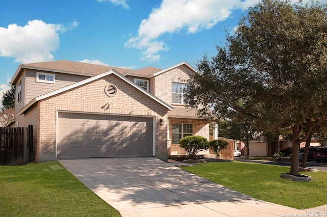 view of front of house featuring a front yard and a garage