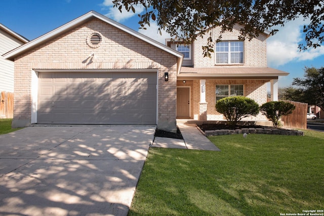 view of front of home featuring a garage and a front lawn