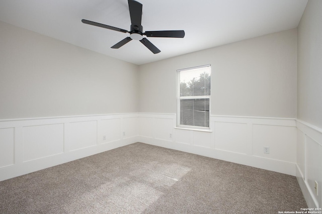 unfurnished room featuring carpet flooring and ceiling fan