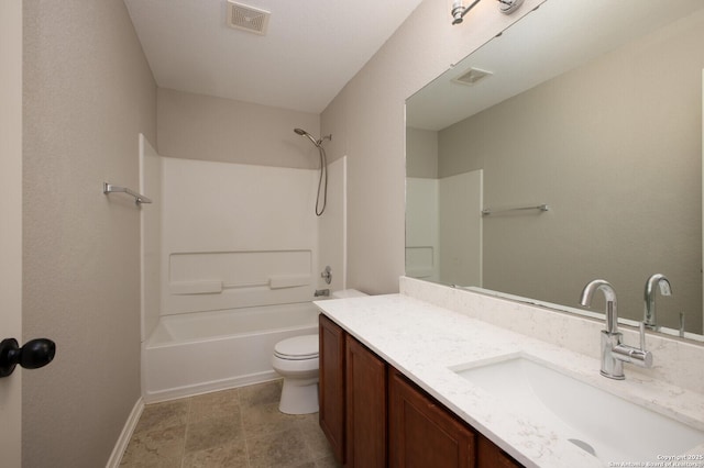 full bathroom with bathtub / shower combination, vanity, and toilet