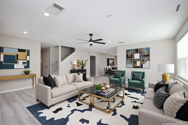 2262 Colorado Bnd, San Antonio, TX 78245 - living room featuring stairway, wood finished floors, recessed lighting, ceiling fan, and baseboards