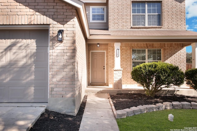 property entrance with a garage