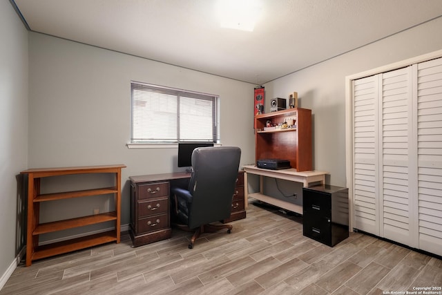 office space featuring light hardwood / wood-style floors