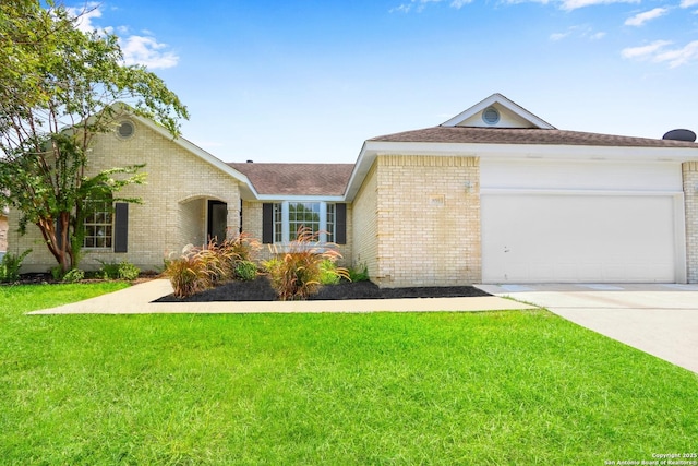 ranch-style house featuring a garage and a front yard