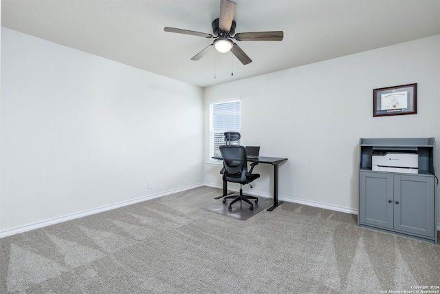 carpeted office with ceiling fan