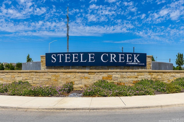 view of community sign