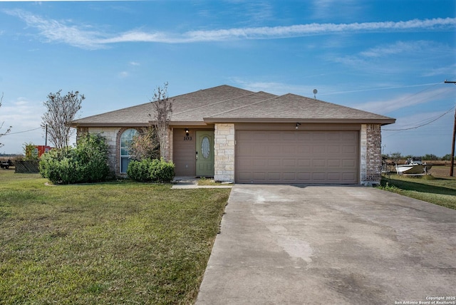 ranch-style home with a front yard and a garage