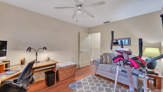 home office featuring ceiling fan and wood-type flooring