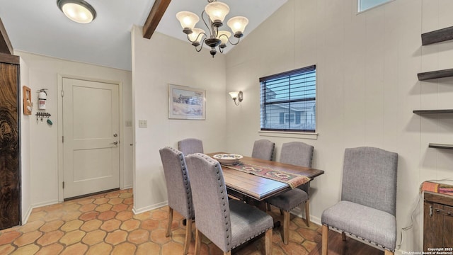 dining space with a chandelier and beam ceiling