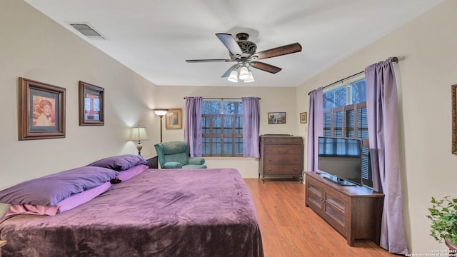 bedroom featuring ceiling fan and light wood-type flooring