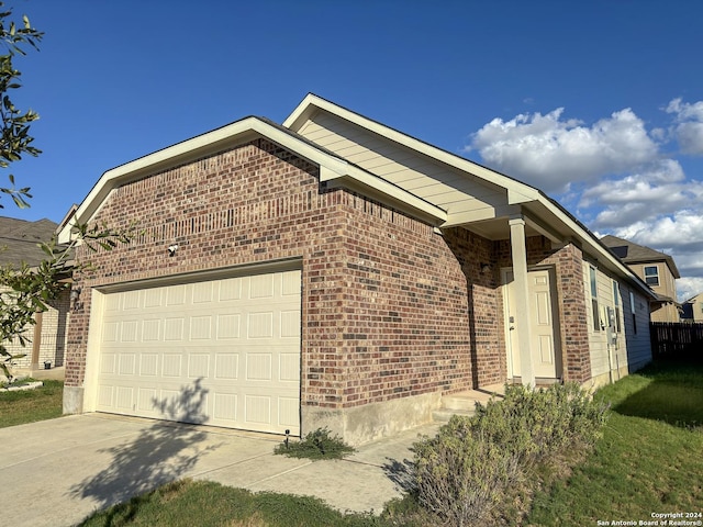 view of home's exterior featuring a garage