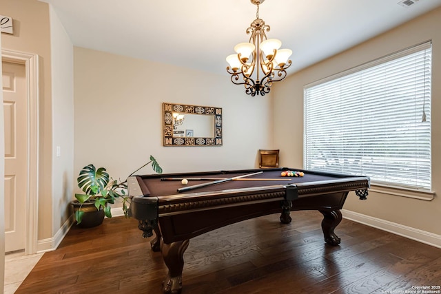 rec room with hardwood / wood-style floors, pool table, a chandelier, and a healthy amount of sunlight