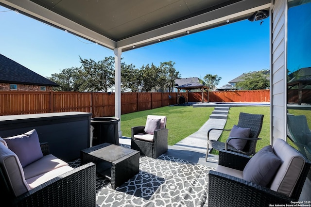 view of patio with outdoor lounge area and a gazebo