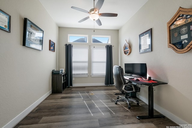 office space with dark hardwood / wood-style flooring and ceiling fan