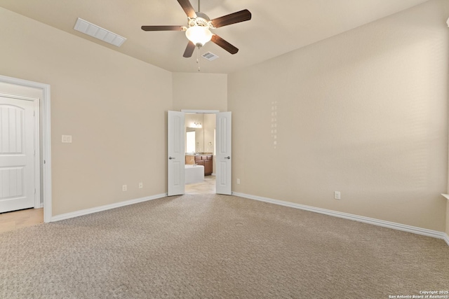 unfurnished bedroom with light carpet and ceiling fan