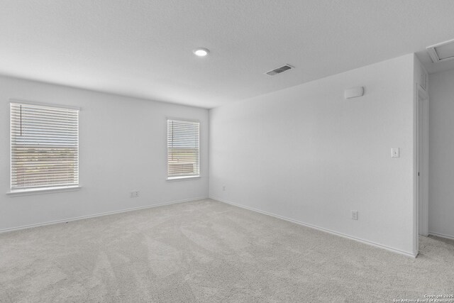 empty room with light carpet