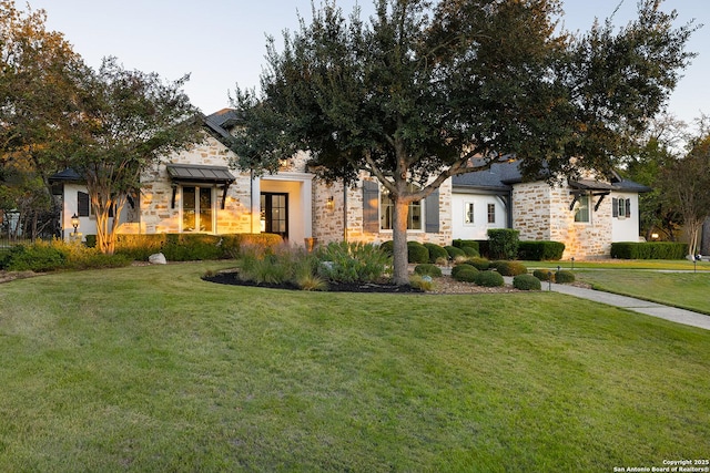 view of front of home with a front yard