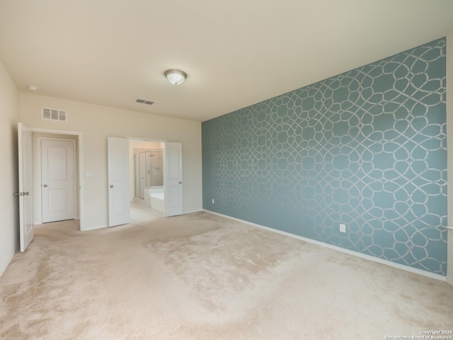 unfurnished bedroom featuring carpet flooring