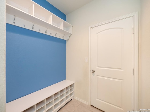 mudroom with light tile patterned floors