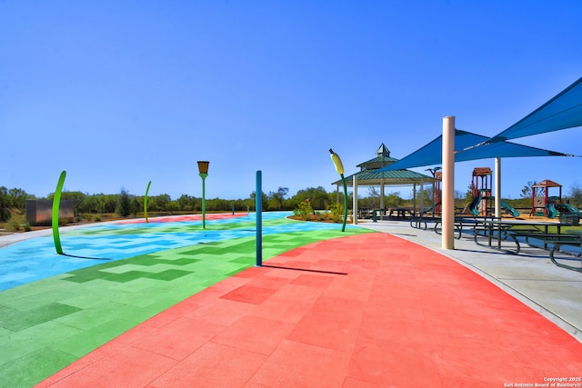 view of property's community with a gazebo and a playground