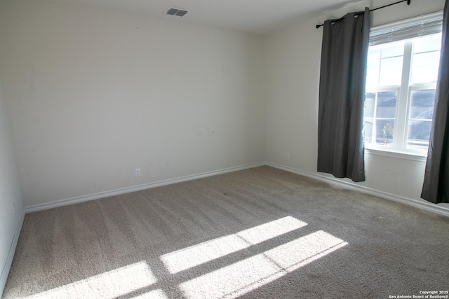 view of carpeted spare room