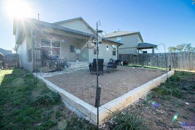 rear view of house featuring a patio