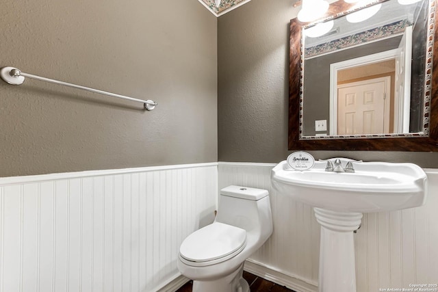 bathroom with toilet and sink