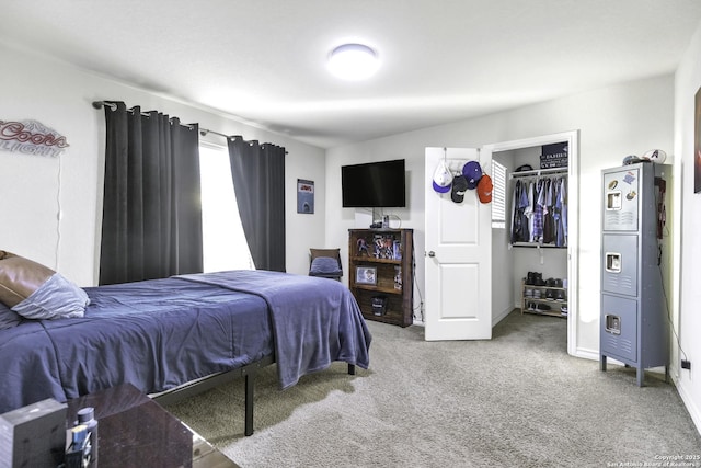 carpeted bedroom with a closet