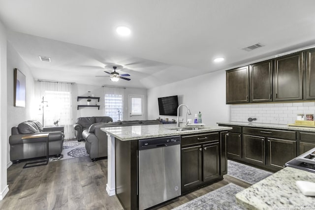 kitchen with backsplash, sink, stainless steel dishwasher, dark hardwood / wood-style floors, and dark brown cabinets