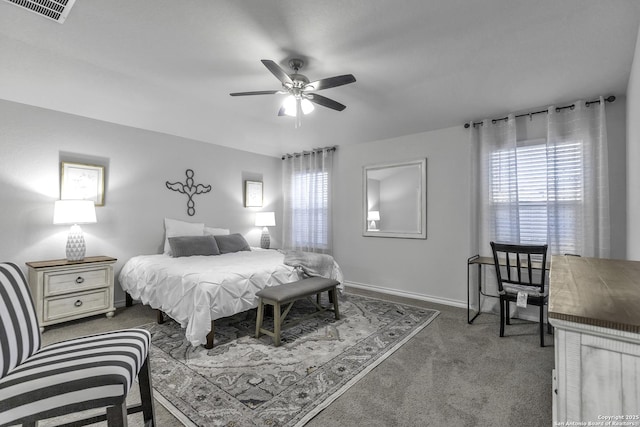 bedroom with ceiling fan and carpet