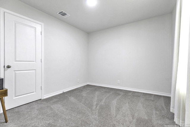 spare room with carpet flooring