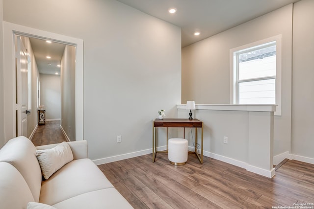 home office with light hardwood / wood-style floors