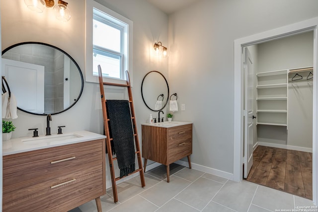 bathroom with vanity and tile patterned floors