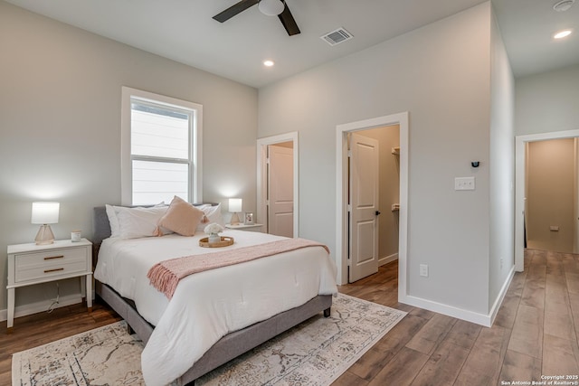 bedroom featuring wood-type flooring and ceiling fan