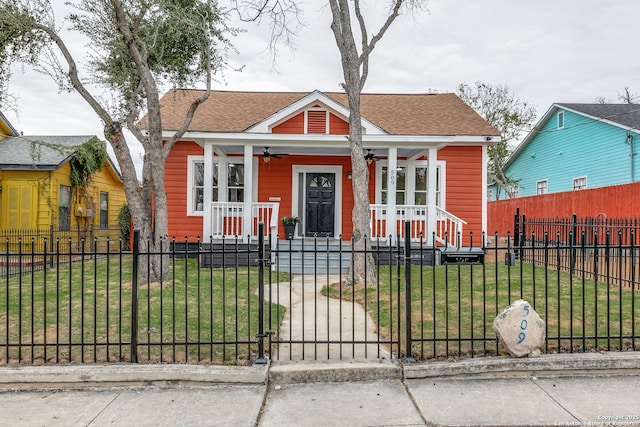 bungalow-style home with a front lawn