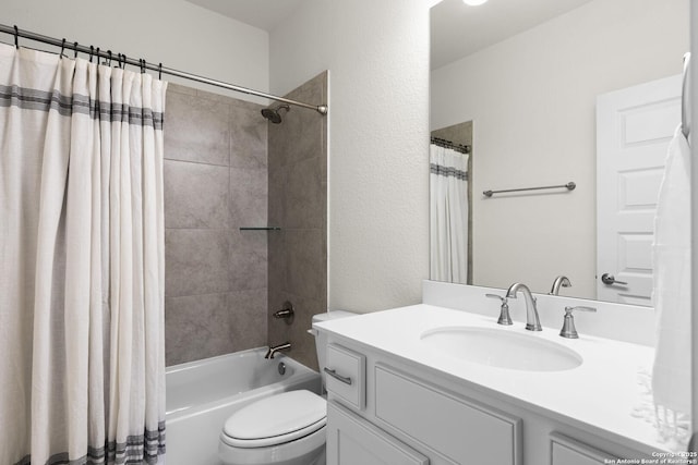 full bathroom featuring shower / bath combination with curtain, toilet, and vanity