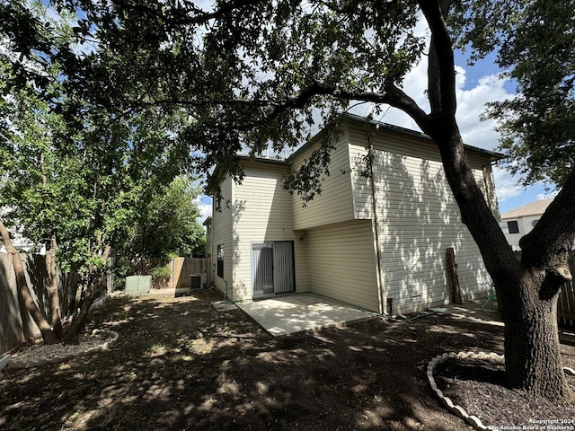 view of home's exterior featuring a patio and central AC