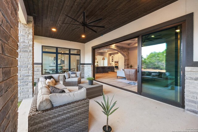 living room featuring concrete floors and wood ceiling